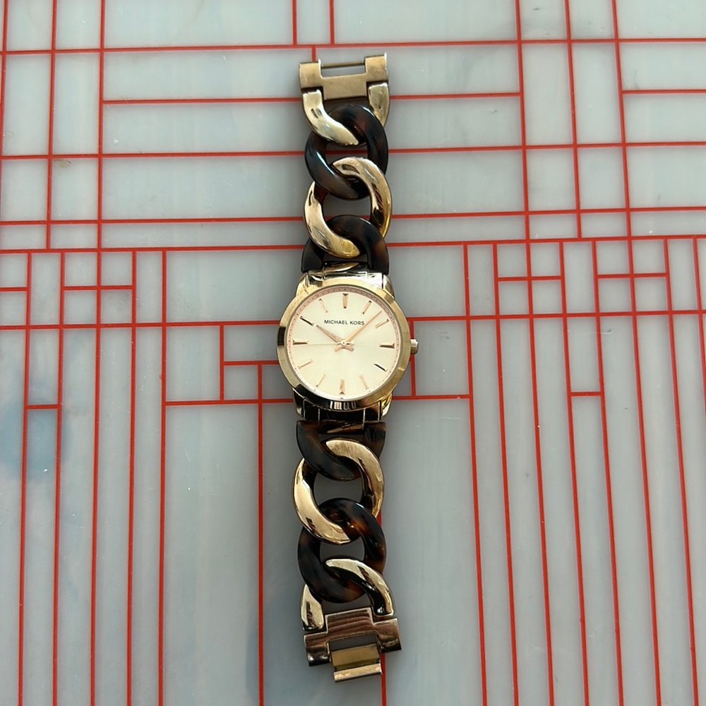 Michael Kors turtoise and rose gold chain watch